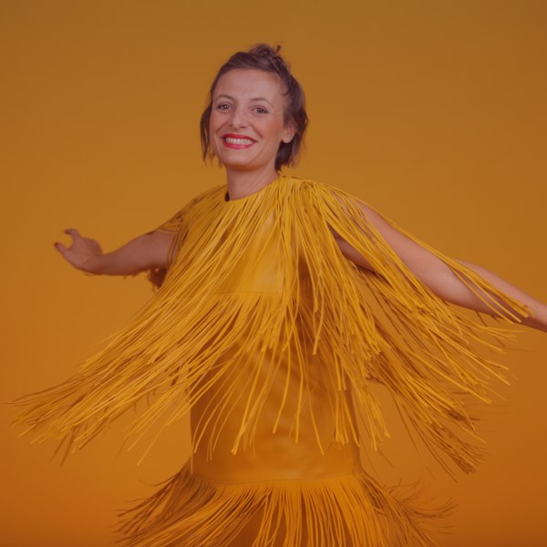 Isabelle Auroux, founder of BORN50, dancing